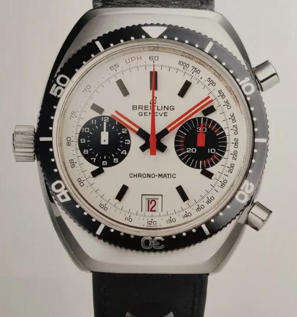 The red elements are striking on the white dial.