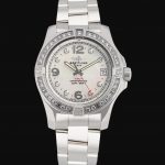 The 36mm replica watch has a white dial.