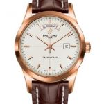The white dial fake watch has a brown strap.