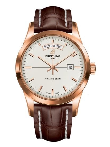 The white dial fake watch has a brown strap.